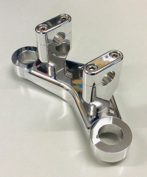 Norton alloy cafe racer top yoke with handlebar riser clamps